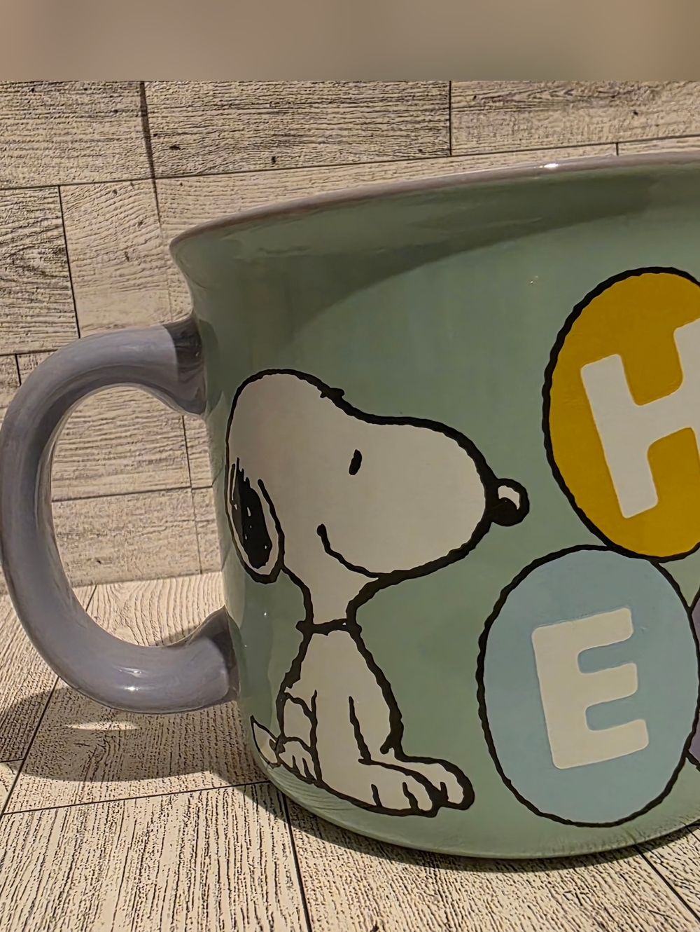 Peanuts Snoopy Ceramic Mug in Light Green and Yellow Accents